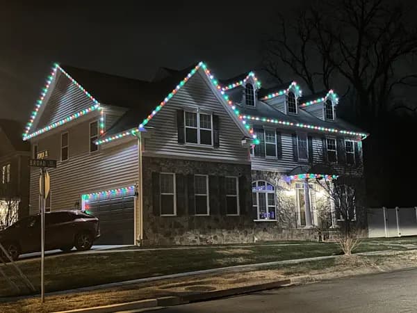 Permanent LED architectural lighting installation by Light DMV — year-round programmable system