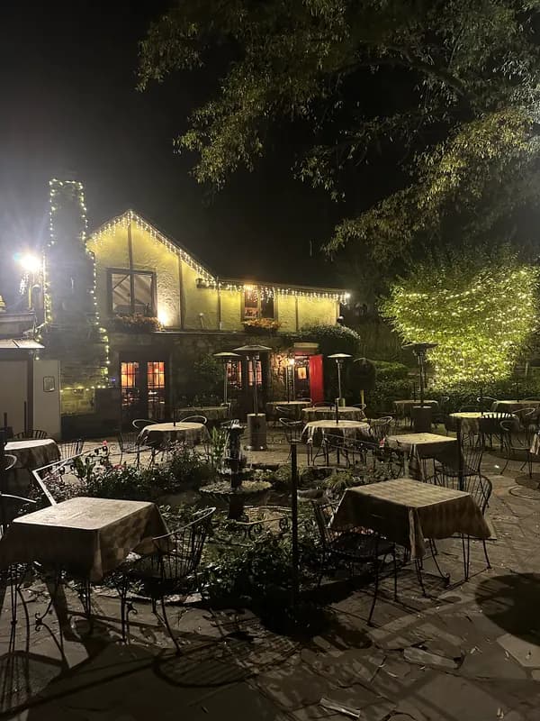 Commercial Christmas light installation at Old Angler's Inn restaurant in Potomac, Maryland by Light DMV