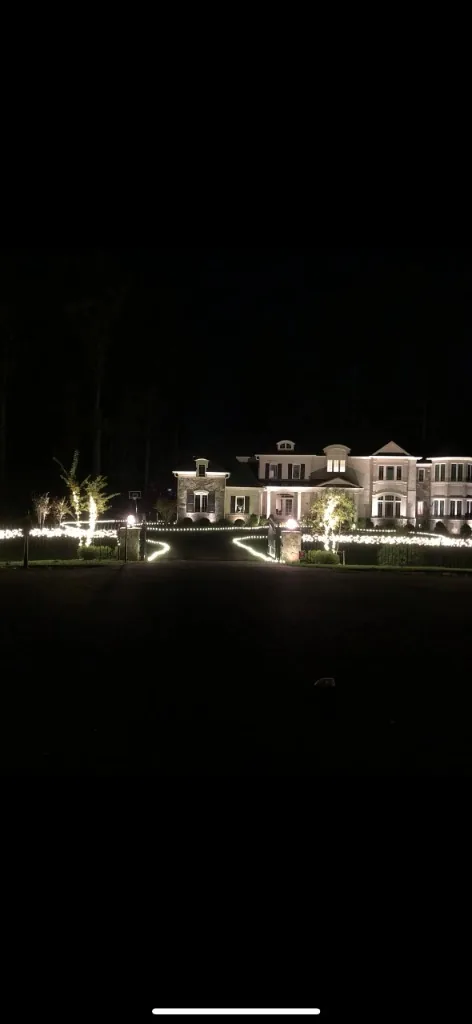 Christmas light installation in the DMV by Light DMV — pathway lighting along a large estate driveway