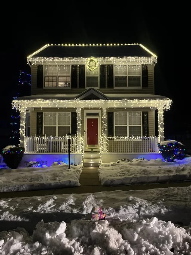 Christmas light installation in the DMV by Light DMV — warm white roofline and landscape lights