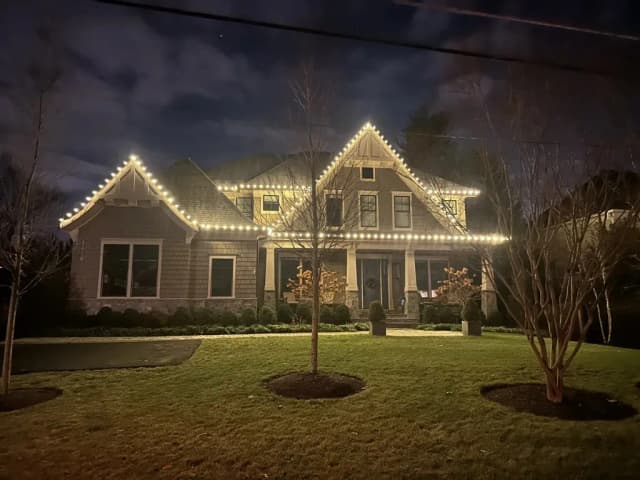 Christmas light installation in the DMV by Light DMV — bright warm white holiday roofline