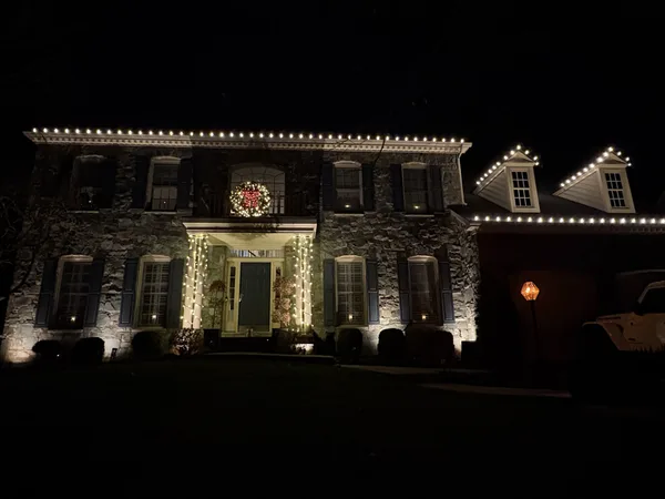 Holiday light installation in Loudoun County, VA by Light DMV — historic-district style Leesburg home